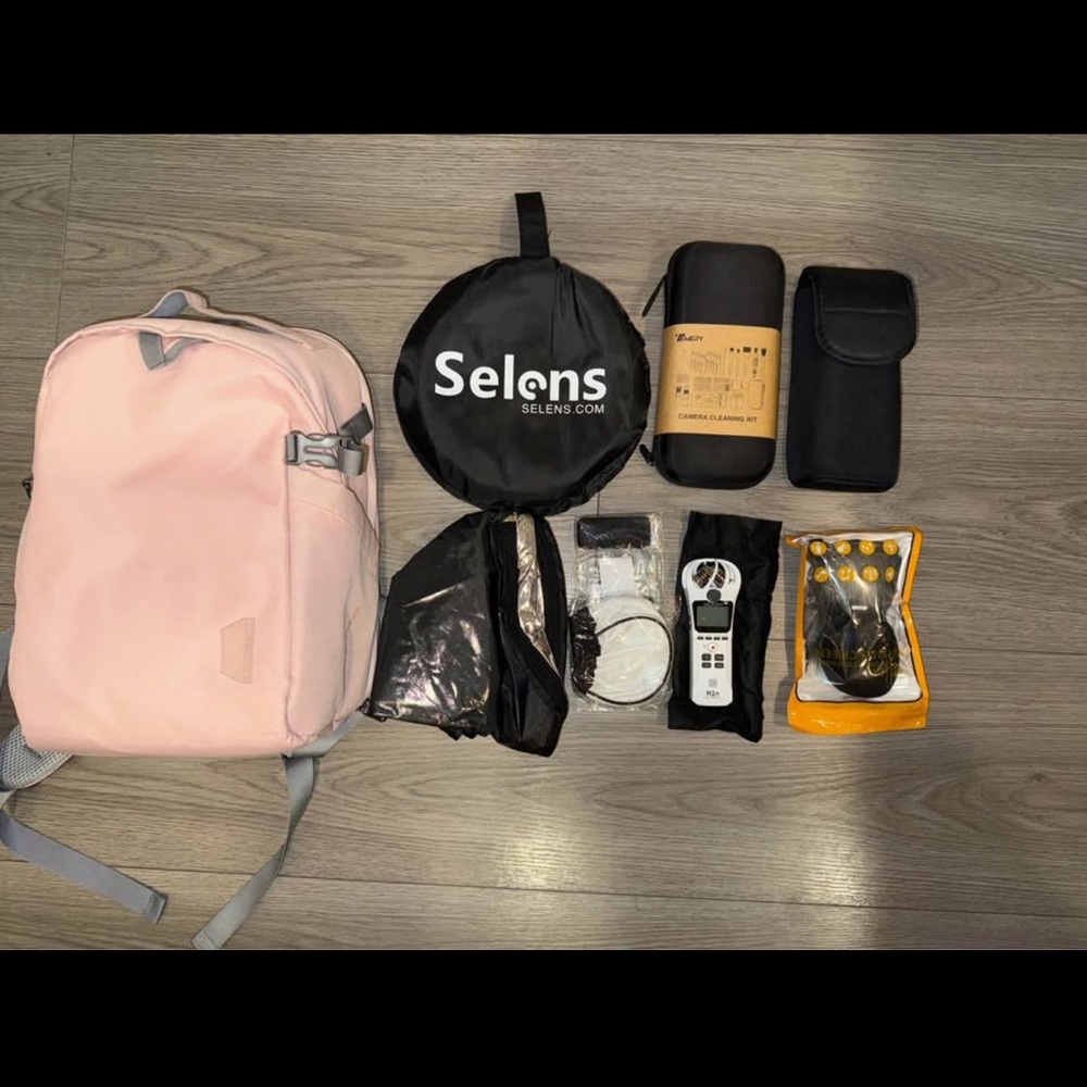 Pink camera Backpack with Photography and journalist Accessories